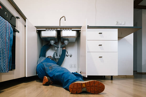 Professional Emergency Plumber technician working in Fisherville, KY